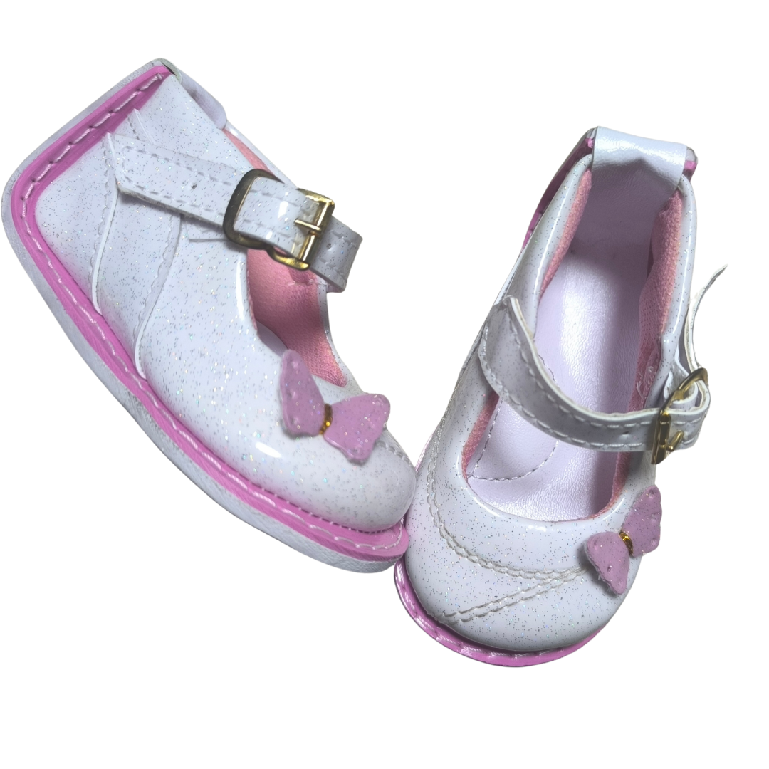 Zapato no tuerce escarchado con mariposita para niña