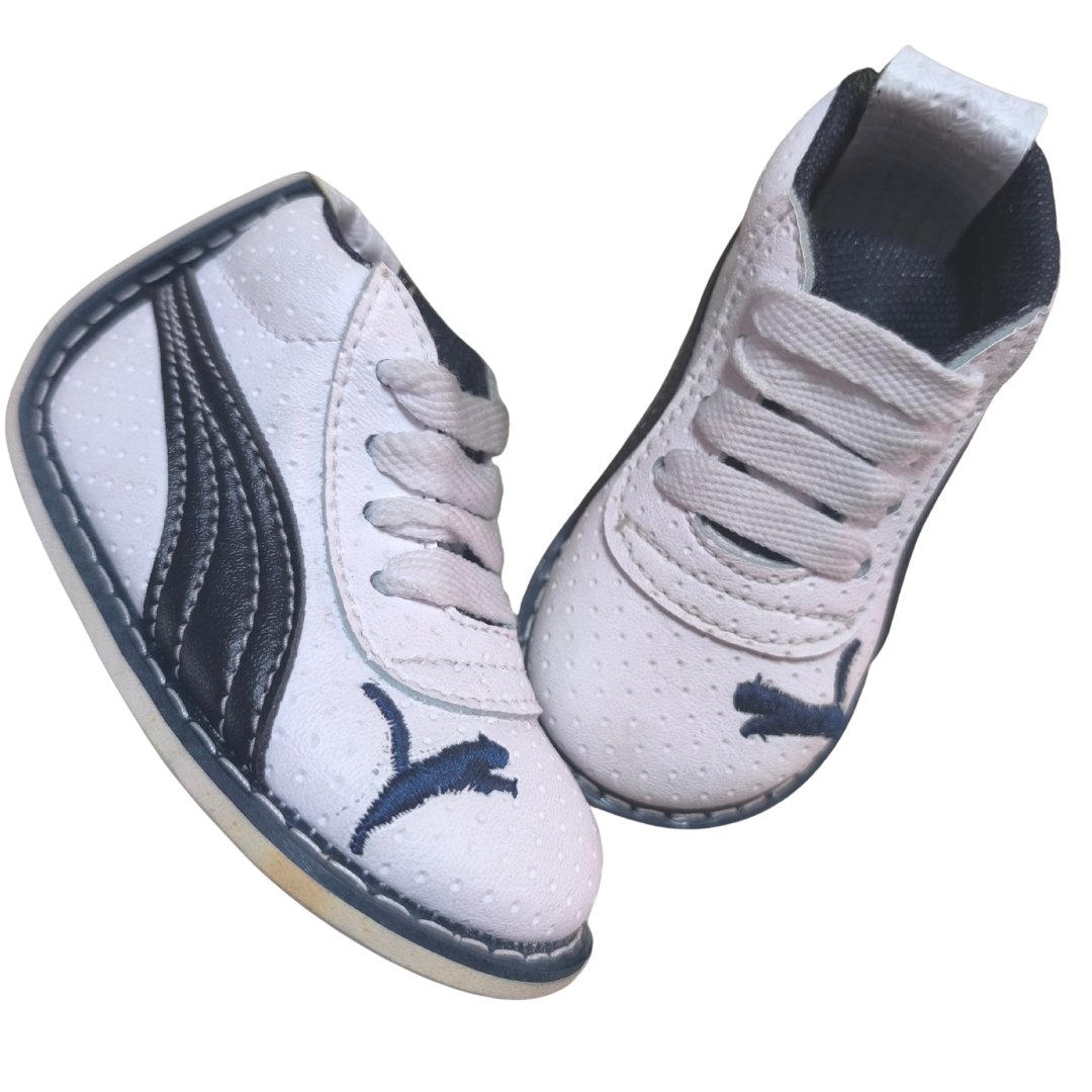 Tenis no tuerce blanco para niño