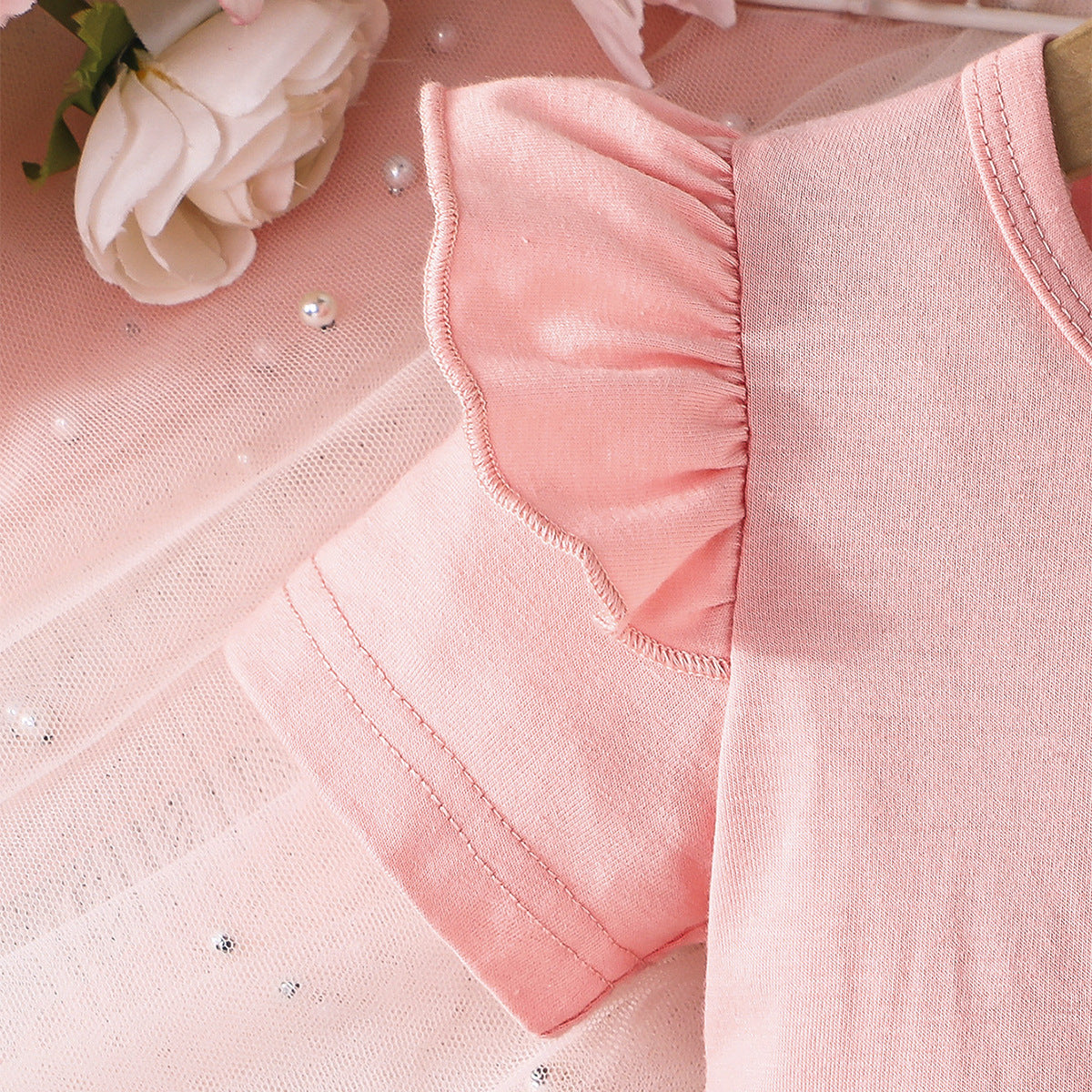 Conjunto con blusa y pantalón estampado para niña