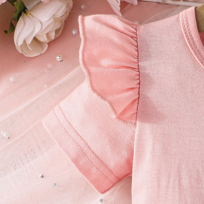 Conjunto con blusa y pantalón estampado para niña