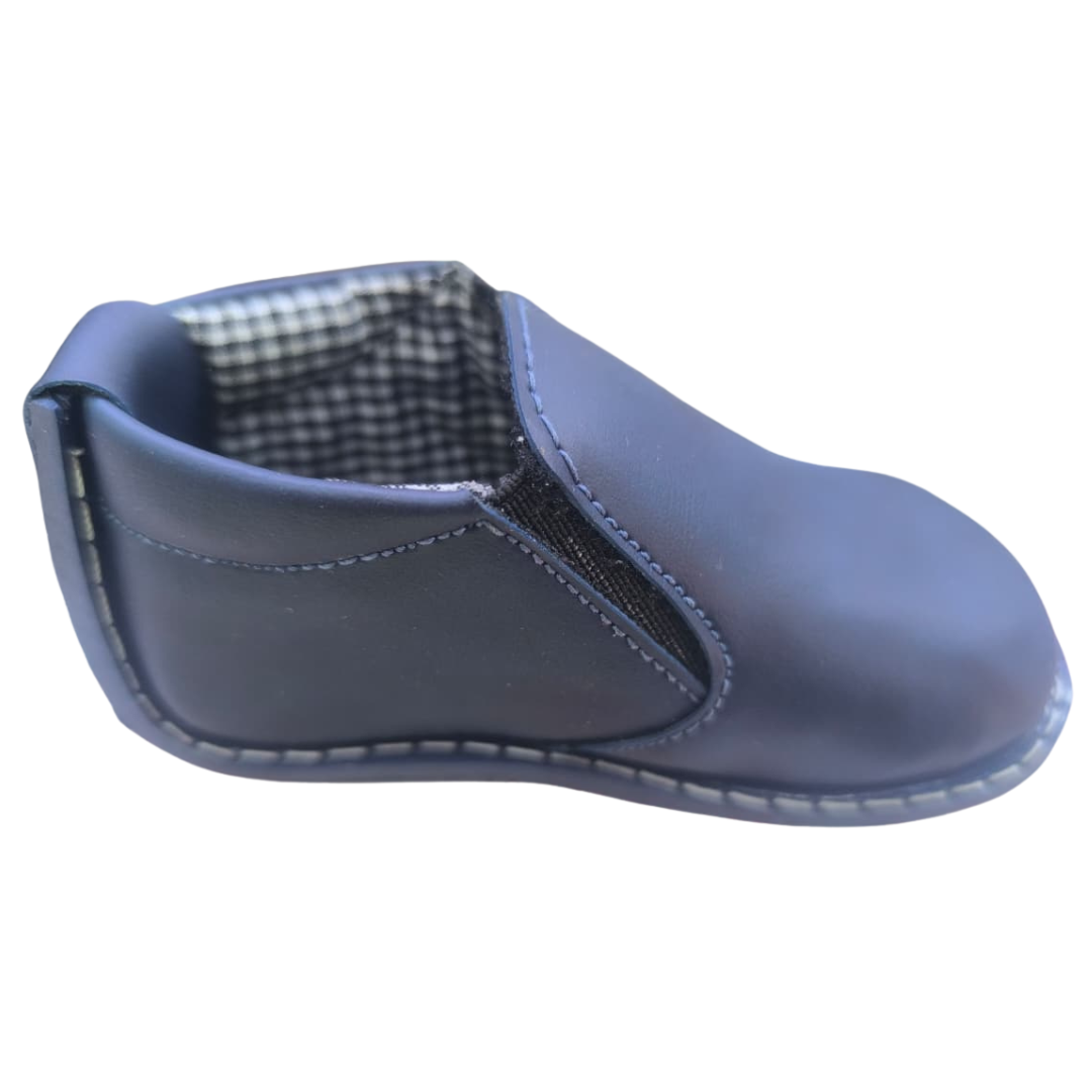 Zapato no tuerce mocasín beige para niño