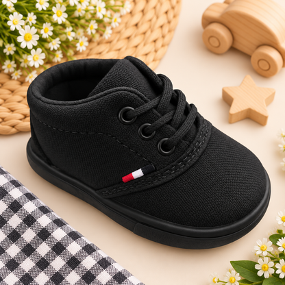 Zapato suela blanda con cordón para niño